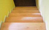 Betontreppe verkleidet mit Buche